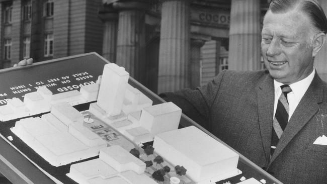 Clem Jones – pictured in November 1966 with a scale model of the proposed Anzac Square – is often credited with turning Brisbane into the cosmopolitan city that it is today. Picture: The Courier-Mail Photo Archive.