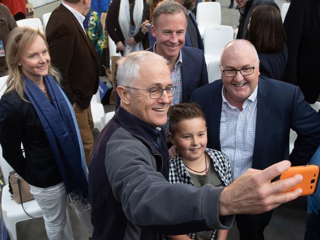 11-year-old Jonah Evans poses for a selfie with Prime Minister Malcolm Turnbull, Sarah Courtney MHA, Premier Will Hodgman and Braddon by-election candidate Brett Whiteley. Picture: GRANT WELLS