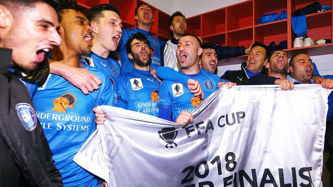 MELBOURNE, AUSTRALIA - AUGUST 21:  Ramazan TAVSANCIOGLU of Avondale (C) and teammates celebrate the win during the FFA Cup round of 16 match between Avondale FC and Devonport Strikers at ABD Stadium on August 21, 2018 in Melbourne, Australia.  (Photo by Michael Dodge/Getty Images)