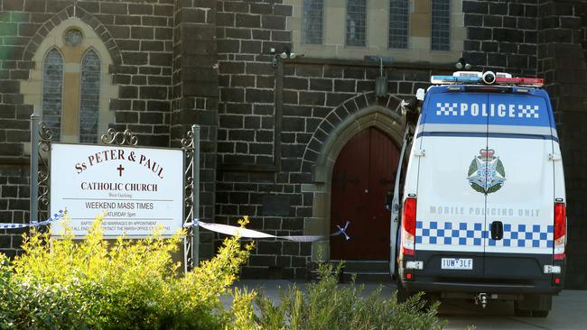 Police investigating after a body was found on Malone St in Geelong near the St Peter and Paul Catholic Church. Picture: Alison Wynd