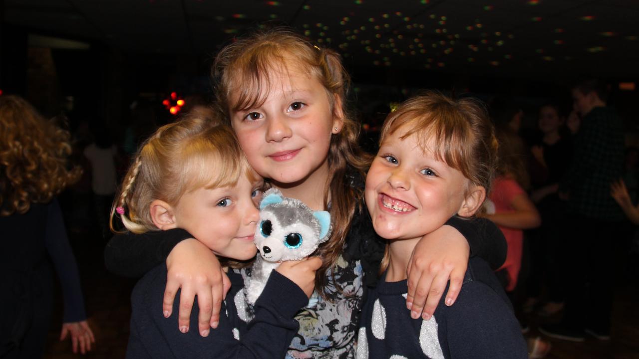 Angela Puglisi, Siena Zanatta and Keesha Puglisi showed had an awesome time at the Blue Light Disco on Friday night. Photo Erin Smith / Stanthorpe Border Post