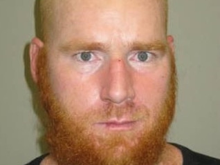 Police say 38-year-old Daniel Baumgart may have changed his features by shaving his beard and head and be staying with others in the Maryborough area. Police want to speak with Mr Baumgart in regards to the death of a 43-year-old Crestmead man at Ross Creek on Sunday.