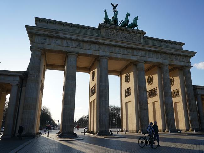 Berlin’s Brandenburg Gate, a popular landmark and tourist destination, stood nearly devoid of visitors. Picture: Getty Images