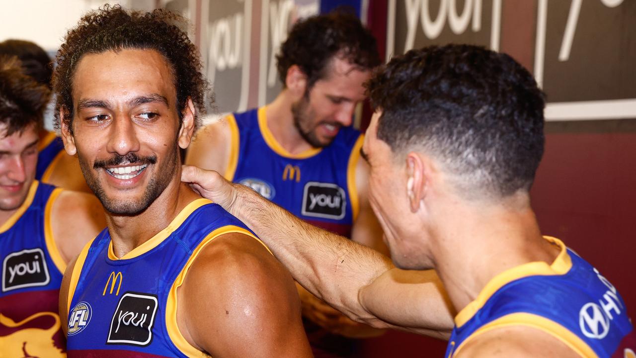 Bruce Reville (left) celebrates Brisbane’s win over Geelong with Charlie Cameron. Picture: Russell Freeman/AFL Photos via Getty Images