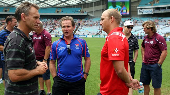 NRL - Fan Day at ANZ Stadium . NRL coaches ( L to R ) Neil Henry , Brian Smith , Nathan Brown , Matthew Elliott and Des HAsler Pic;Gregg Porteous