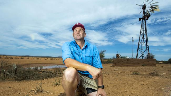 Sheep farmer Michael Burford on his last drying dam with the bones of lost sheep from the last drought on his Merngenia Station north east of Peterborough. Picture: Mark Brake