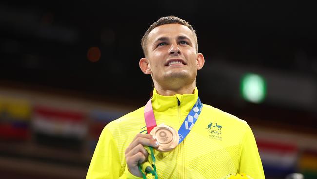 Harry Garside celebrating his bronze medal for the Men's Light Final at the Tokyo 2020 Olympic games. Picture: Buda Mendes