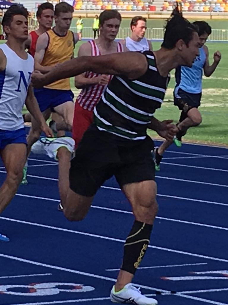 Xavier Savage wins the 100m GPS title.