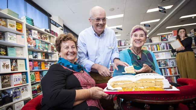 Clive Tilsey in February 2020 with Margaret Coxall, left, and Jenny Smith, the granddaughters of Bill Fuller, who opened the first Fullers bookstore 100 years earlier. Picture: LUKE BOWDEN