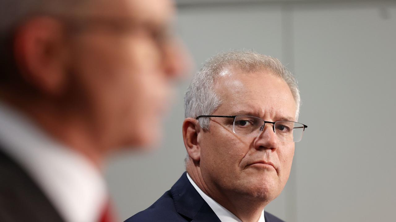 Prime Minister Scott Morrison with chief medical officer Paul Kelly announcing the AstraZeneca recommendation. Picture: NCA NewsWire/Gary Ramage