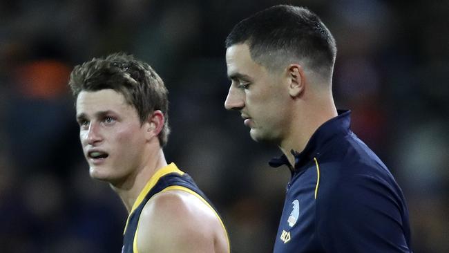 Adelaide’s Taylor Walker leaves the playing field with "hamstring awareness" in the round six clash with Gold Coast. Picture: Sarah Reed