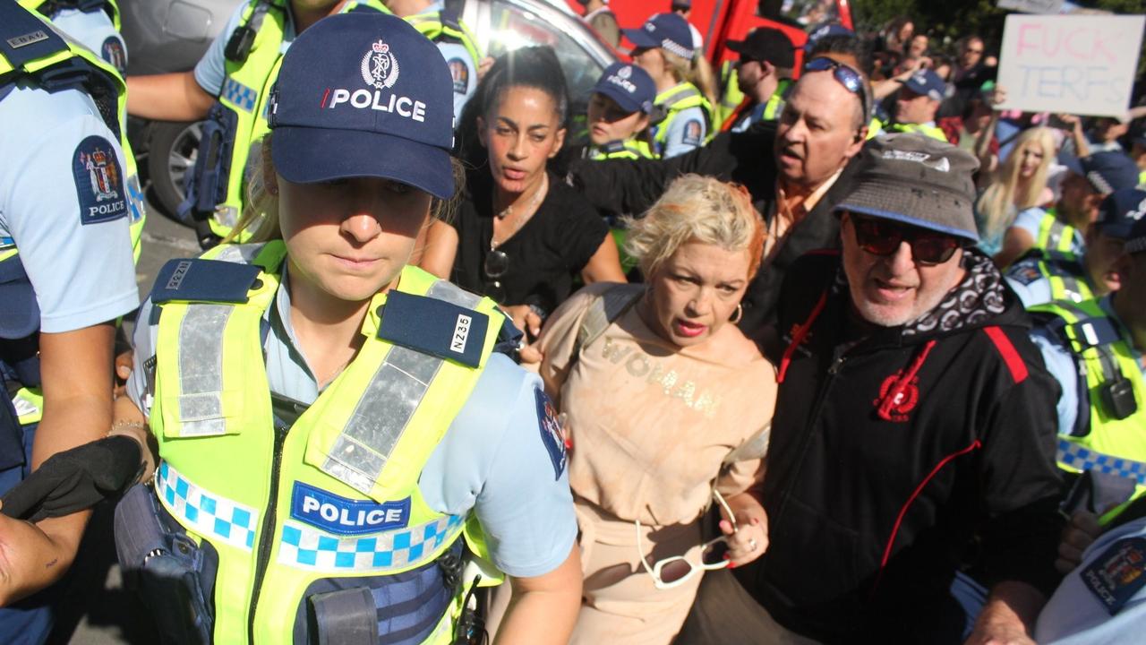 Anti-transgender campaigner Kellie-Jay Keen-Minshull has been forced to cut a rally short after she was attacked with juice in New Zealand today. Picture: Dylan Reeve