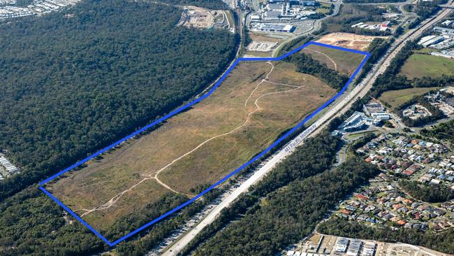 Aerial photo of Lot 1, Pacific Highway, a 54.99ha site near Westfield Coomera which is now on the market. Picture: Supplied by Colliers