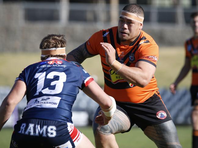 Tigers prop Joseph Ualesi takes on Camden lock, Tom Chanter. Picture Warren Gannon Photography