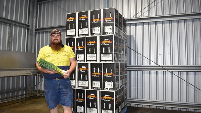 Operations Manager Karl Schulte with produce from Maragi Farms that is about to head into supermarkets for Christmas. Photo: Hugh Suffell.