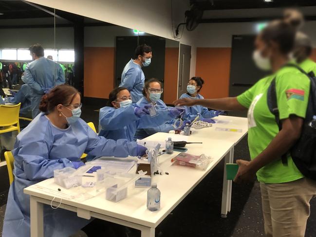 NT Health workers processing people at the Howard Springs Quarantine Facility. Picture: Suppled/ NT Health