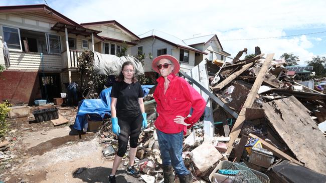 Marie Hainaut and daughter Helene at their Phyllis St home in South Lismore in the aftermath of the devastating floods. Picture: Jason O'Brien