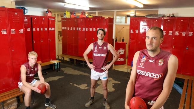 Prince Alfred Old Collegian Players Will Dalwood, Tom Sumner and Jordan Neal in their current change rooms that are in desperate need of repair. Picture Dean Martin