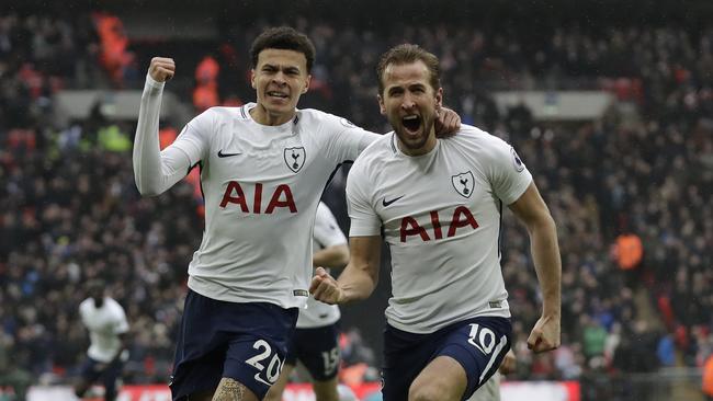 Tottenham Hotspur's Harry Kane right, celebrates with teammate Dele Alli