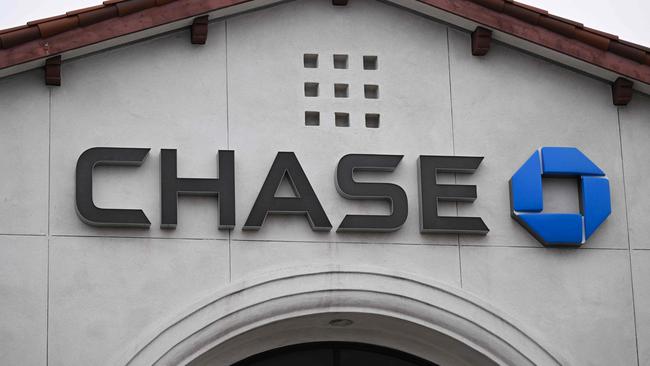 Signage is displayed outside of a Chase Bank branch in Redondo Beach, California, on March 13, 2023. - US President Biden sought to reassure Americans over the country's banking system on Monday, while insisting emergency measures would not be paid for by taxpayers, as additional banks came under stress following the collapse of Silicon Valley Bank last week, the second largest bank failure in history, and New York regulators took control of Signature Bank on Sunday. (Photo by Patrick T. Fallon / AFP)