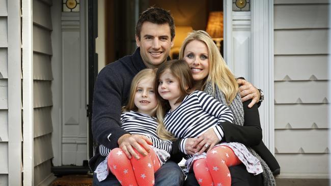 Darren Jolly with wife Dea and daughters Scarlett and Lily.