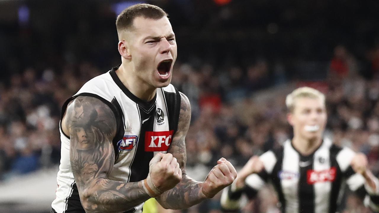 MELBOURNE, AUSTRALIA - AUGUST 05: Jamie Elliott of the Magpies celebrates a goal during the round 21 AFL match between the Melbourne Demons and the Collingwood Magpies at Melbourne Cricket Ground on August 05, 2022 in Melbourne, Australia. (Photo by Darrian Traynor/Getty Images)