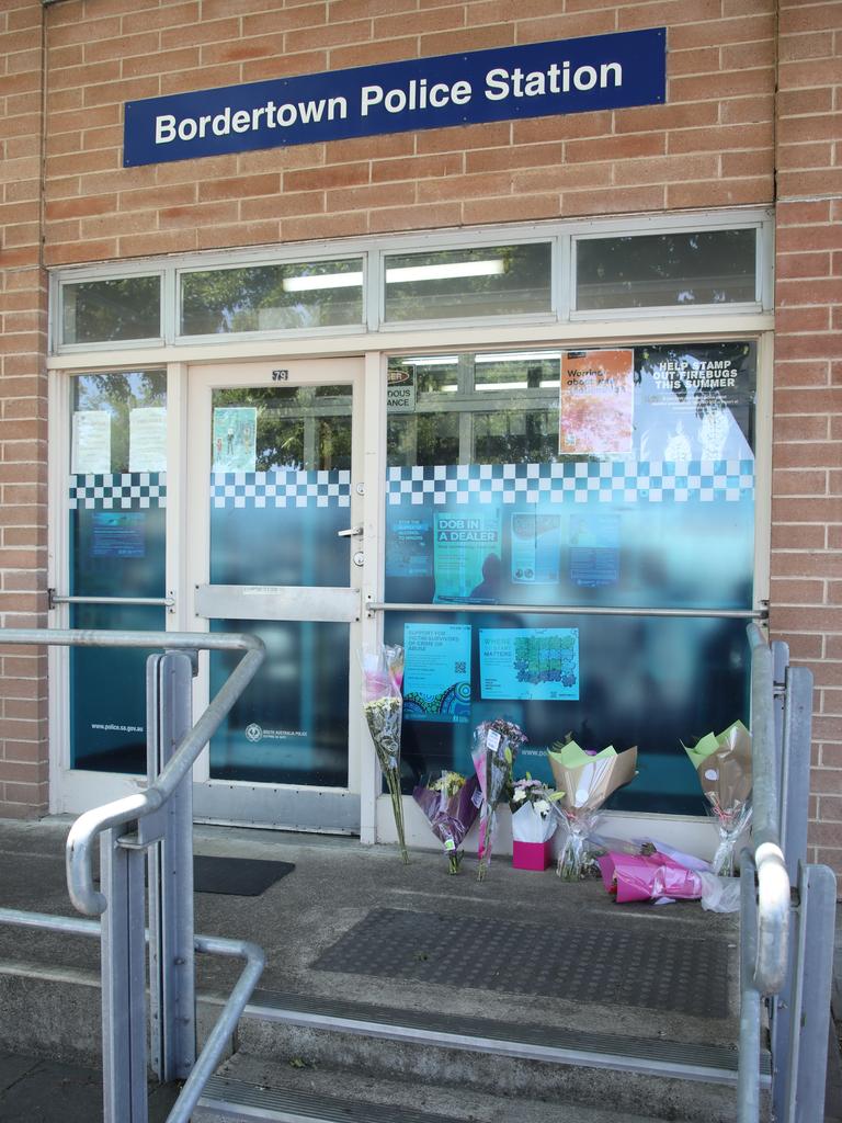 Flowers left in tribute outside the police station at Bordertown. Picture: NCA NewsWire / Dean Martin