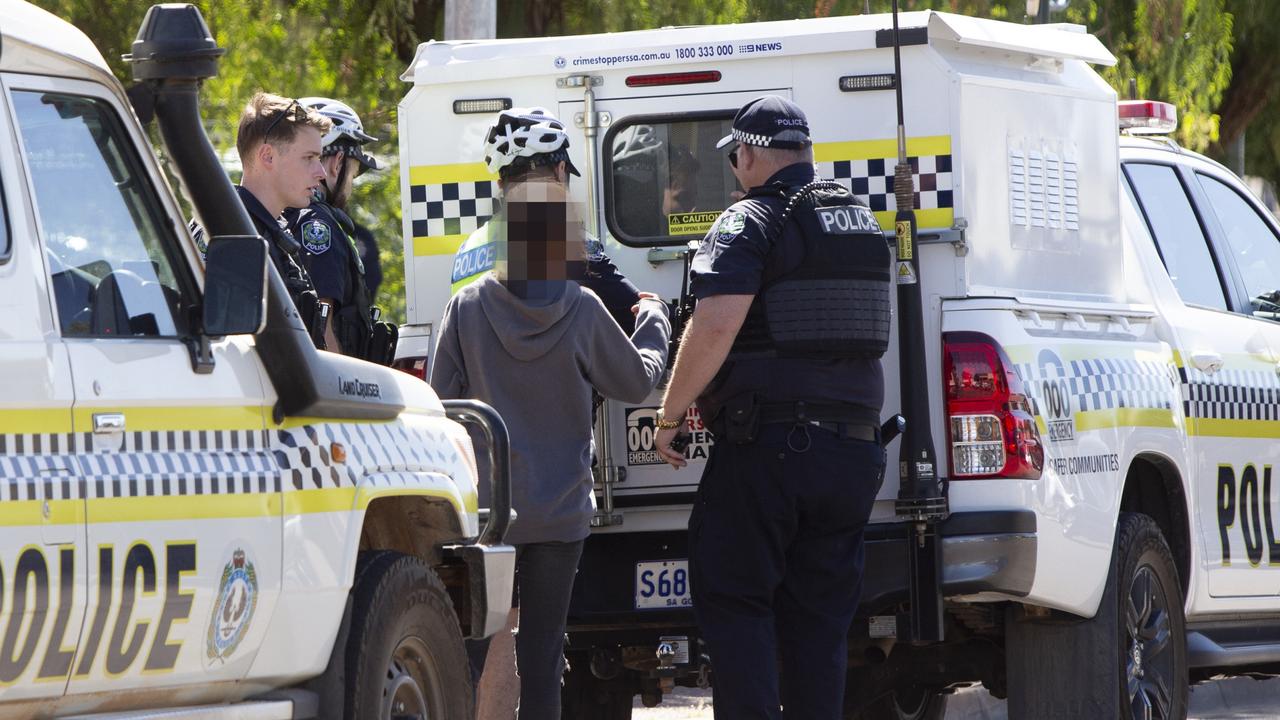 Police in Port Augusta arresting accused youth offenders. Picture: Brett Hartwig