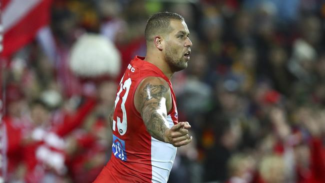 Lance Franklin celebrates his goal after a long run out running Daniel Talia: Picture Sarah Reed