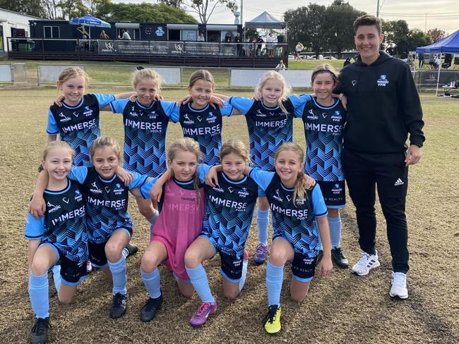 Football Qld: The Magic United U11 Girls team.