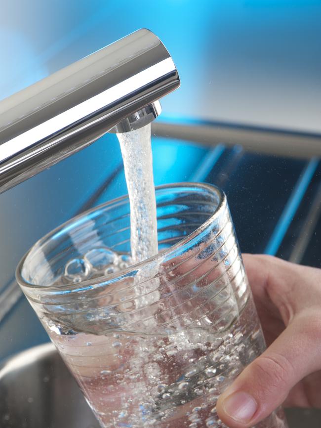 Feeling Great - May 11th, 2015Filling up a glass of water in the kitchen sink. Blue background