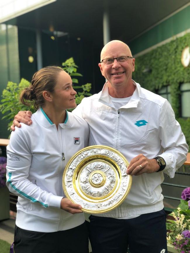 Ash Barty with coach Craig Tyzzer after winning the Wimbledon final.