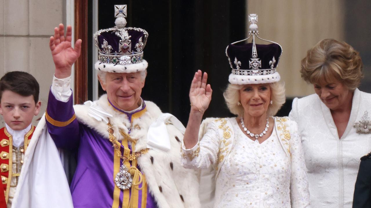 King Charles and Queen Camilla wave to the crowds from the Buckingham Palace balcony. Picture: Getty Images