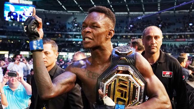 Israel Adesanya celebrates his win against Robert Whittaker. Picture: AAP Image/Michael Dodge