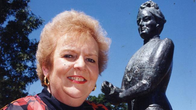 Chairwoman of the Women's Suffrage Centenary steering committee, Mary Beasley, with the Light Square statue of suffragist Catherine Helen Spence in Adelaide, 1994.