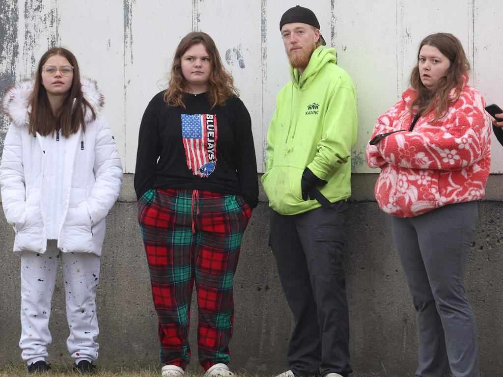 People watch as police respond to a school shooting at the Perry Middle School and High School complex on January 04, 2024 in Perry, Iowa. (Photo by SCOTT OLSON / GETTY IMAGES NORTH AMERICA / Getty Images via AFP)