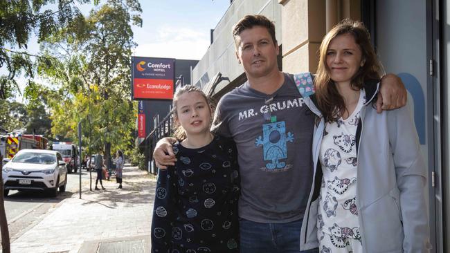 Hong Kong resident Darren Whitfield with his partner, Karolina Miziolek and daughter Isla Whitfield, 11, outside the Comfort Inn Adelaide Meridien on Melbourne St. Picture Emma Brasier