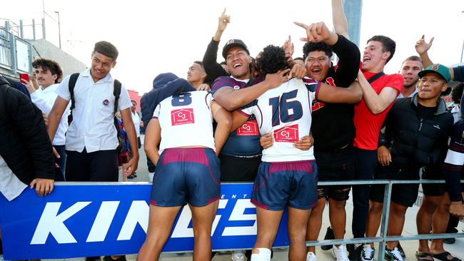 Ipswich Ahmani Leluia and LokO Tonga celebratee with fans. Picture David Clark