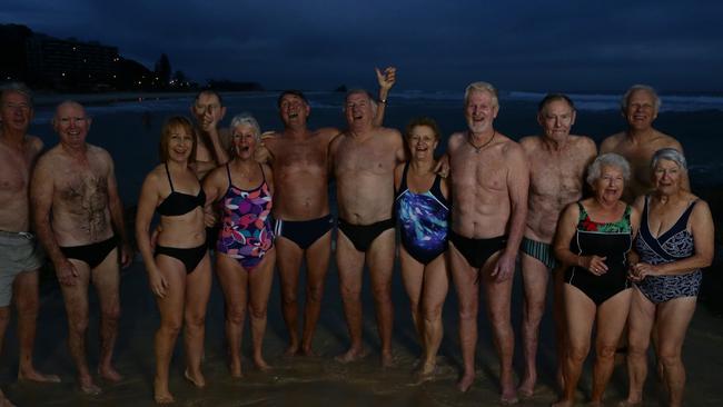 Mick Barry (second from left) and the Currumbin Dingoes went for a swim in the surf at dawn every day rain hail or shine.