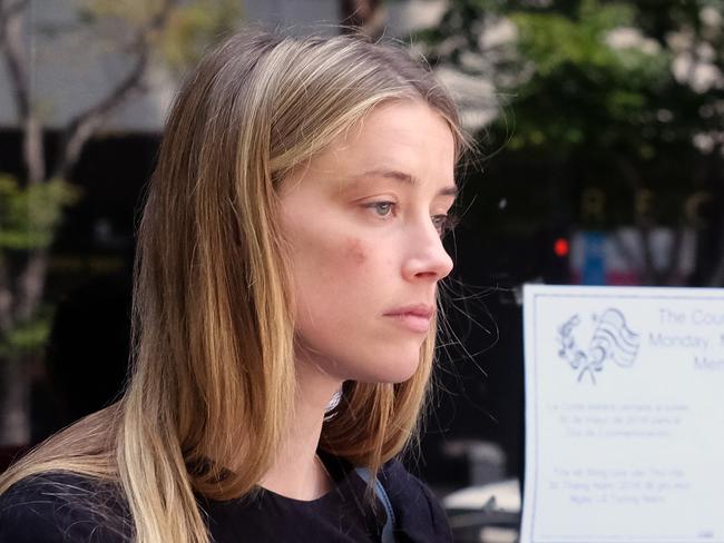 Amber Heard leaves a Los Angeles court after accusing ex Johnny Depp of domestic violence. Picture: AP/Richard Vogel