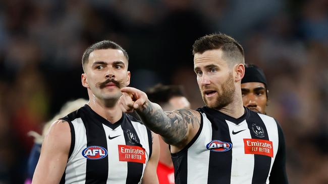 Oleg Markov and Jeremy Howe during first qualifying final match between the Collingwood Magpies and the Melbourne Demons. Picture: Dylan Burns/AFL