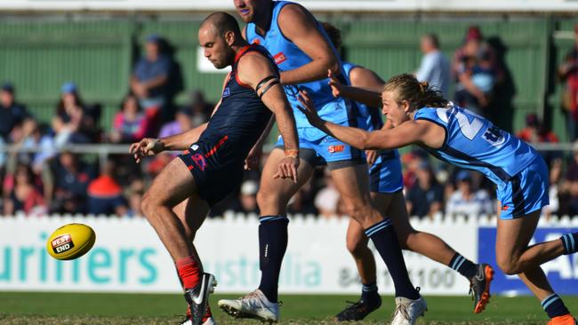 Norwood captain Jace Bode gets a kick away against Sturt. Picture: AAP Image/ Brenton Edwards