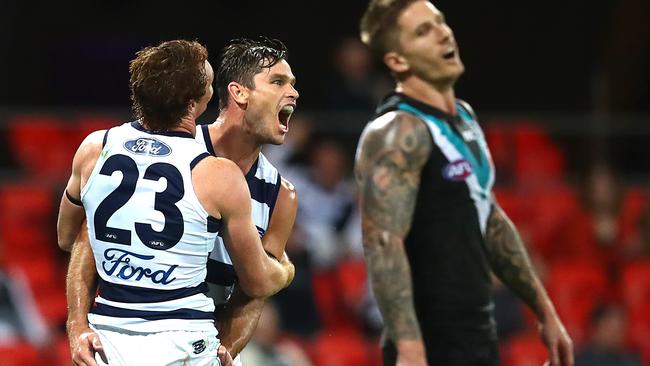 Tom Hawkins of the Cats celebrates a goal against Port Adelaide. Picture: Jono Searle/AFL Photos/via Getty Images