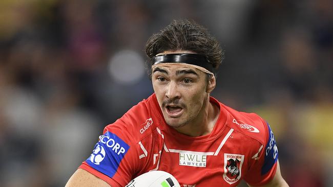 TOWNSVILLE, AUSTRALIA - MARCH 20: Cody Ramsey of the Dragons runs the ball during the round two NRL match between the North Queensland Cowboys and the St George Illawarra Dragons at QCB Stadium, on March 20, 2021, in Townsville, Australia. (Photo by Ian Hitchcock/Getty Images)