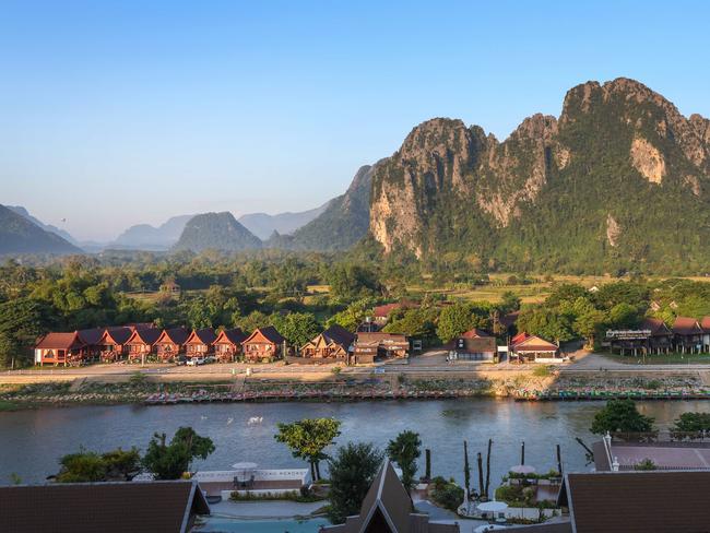 Tourists are drawn to the spectacular views in Vang Vieng. Picture: David Caird