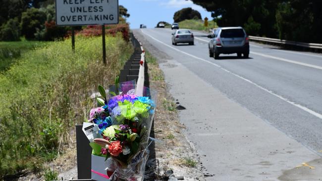 Flower memorial at the scene of a fatal accident on the corner of South Rd and Little Rd, Aldinga. Picture: Campbell Brodie