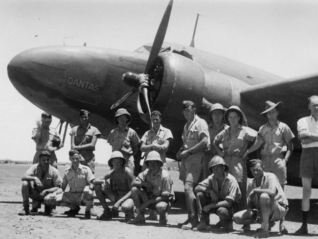 Phillip (squatting second from left) during WWII in Papua New Guinea.