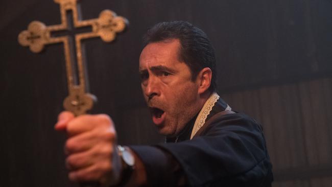 DEMIAN BICHIR as Father Burke in a scene from New Line Cinema's horror film "THE NUN," a Warner Bros. Pictures release.