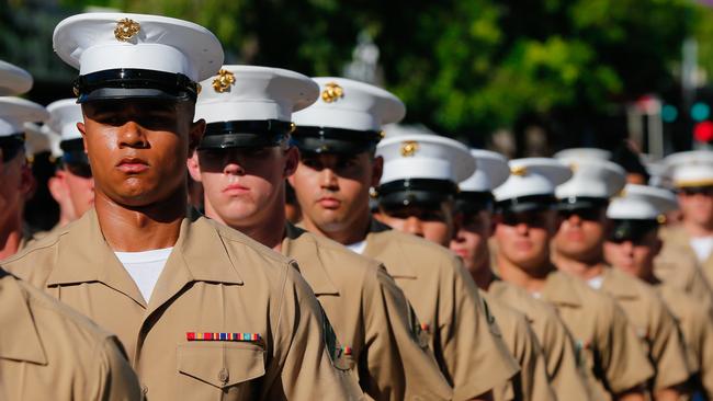 US Marines march in the Darwin CBD on Anzac Day this year ... Pic Glenn Campbell