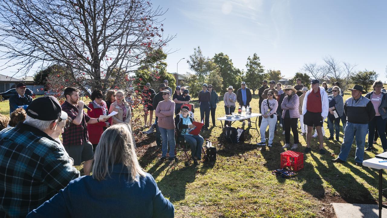 John Bryant speaks at a community meeting at Halsworth Street Park opposing proposed material change of use to create the Greenwattle Wellness Community development on Greenwattle St, Saturday, June 24, 2023. Picture: Kevin Farmer